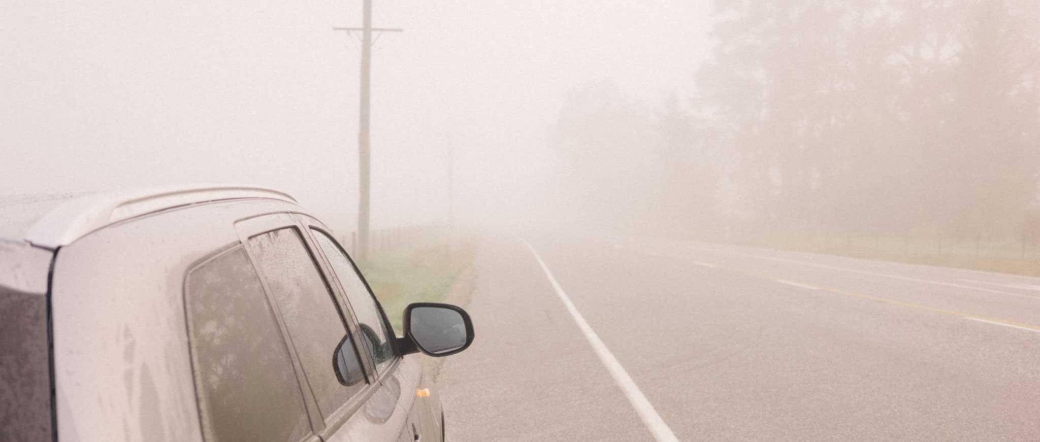 Early-morning driving in heavy fog